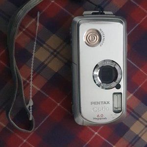 Pentax Optio WP I 6.0 MP Digital Camera with 3x Optical Zoom -Waterproof